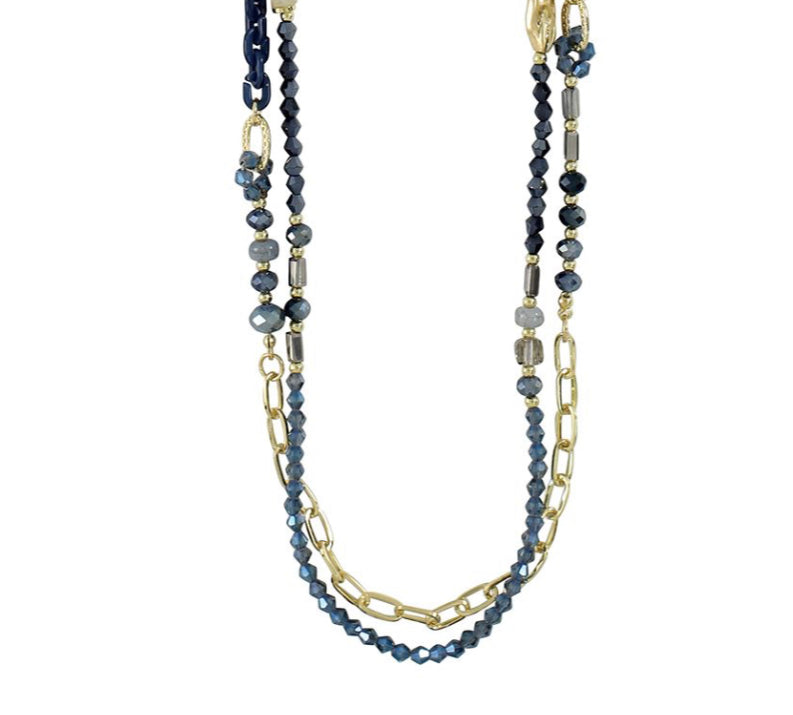 Gold links with faceted sapphire blue glass crystals