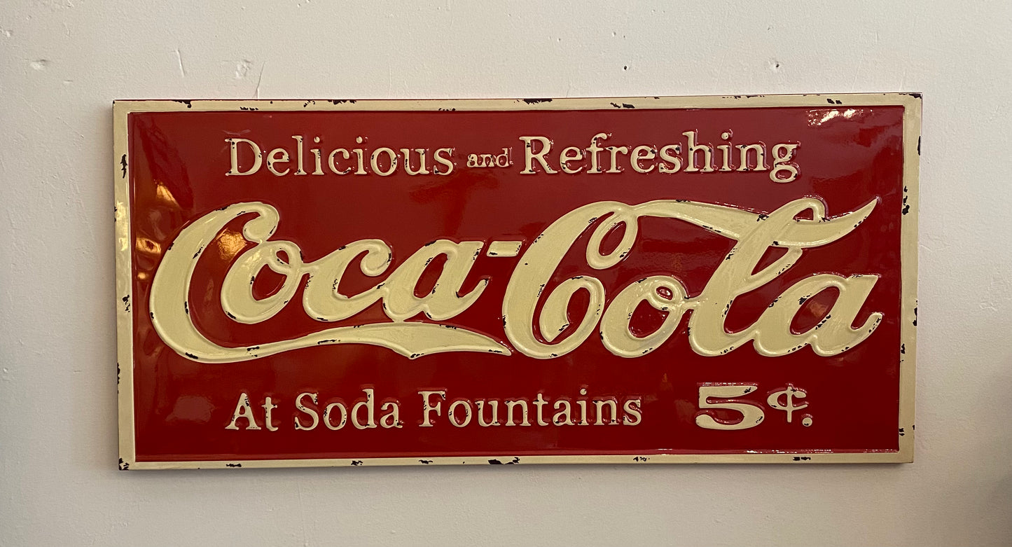 Coca Cola At soda fountains sign